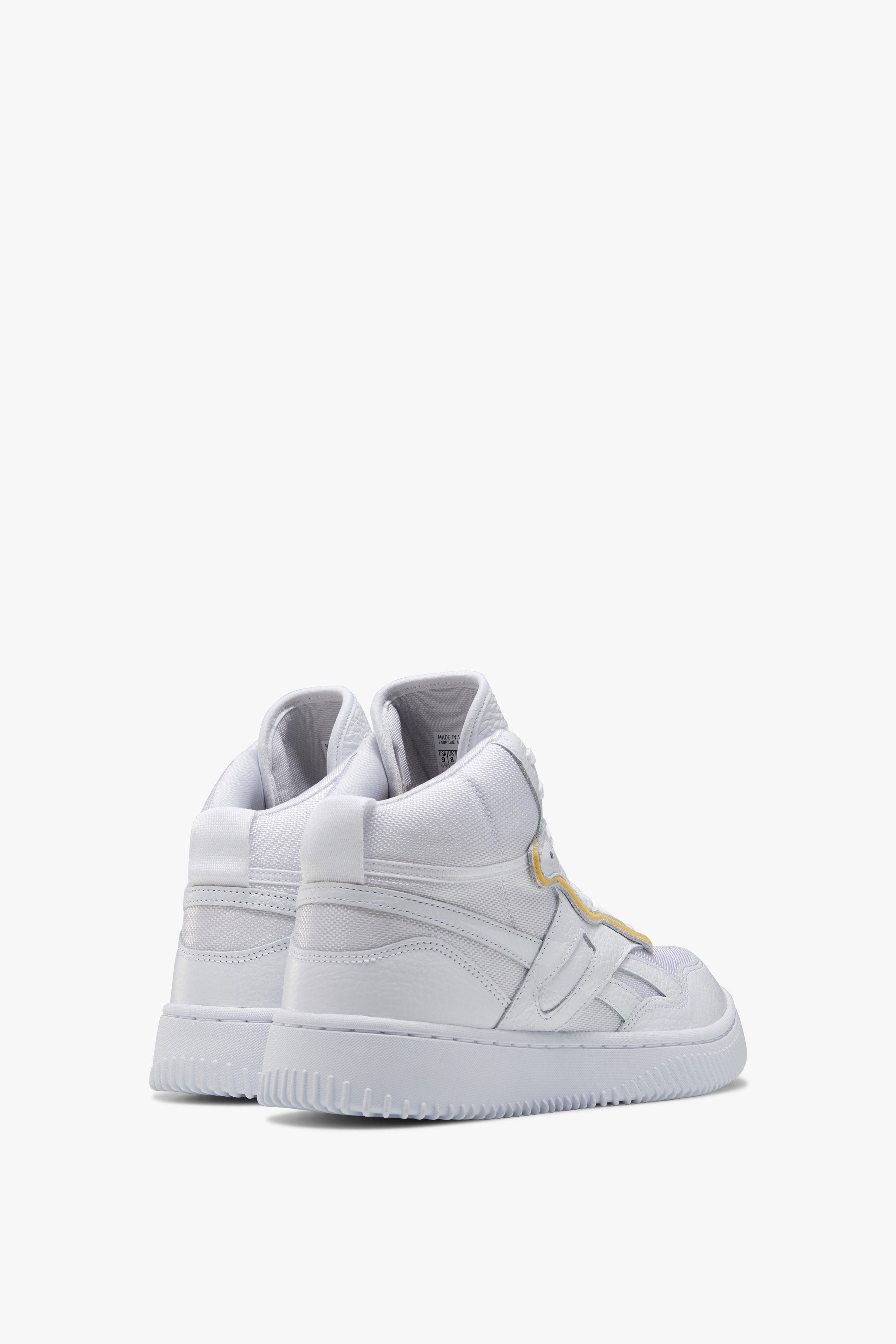 Reebok VB Dual Court Mid in White sneakers.